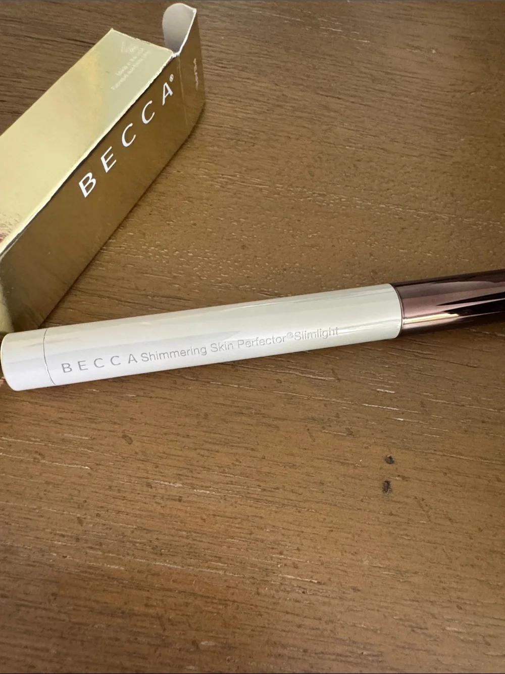 BECCA Shimmering Skin Perfector Liquid Highlighter - Gold Pearl Packaging